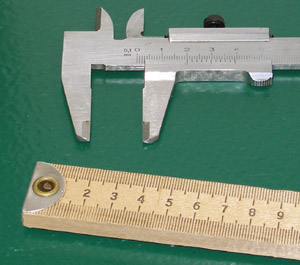a meter stick and a caliper