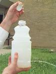 A bottle with a hole in it