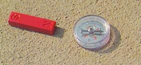 note which way the compass is pointing